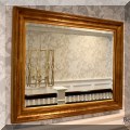 DM02. Gilt wall mirror with beveled edge. 